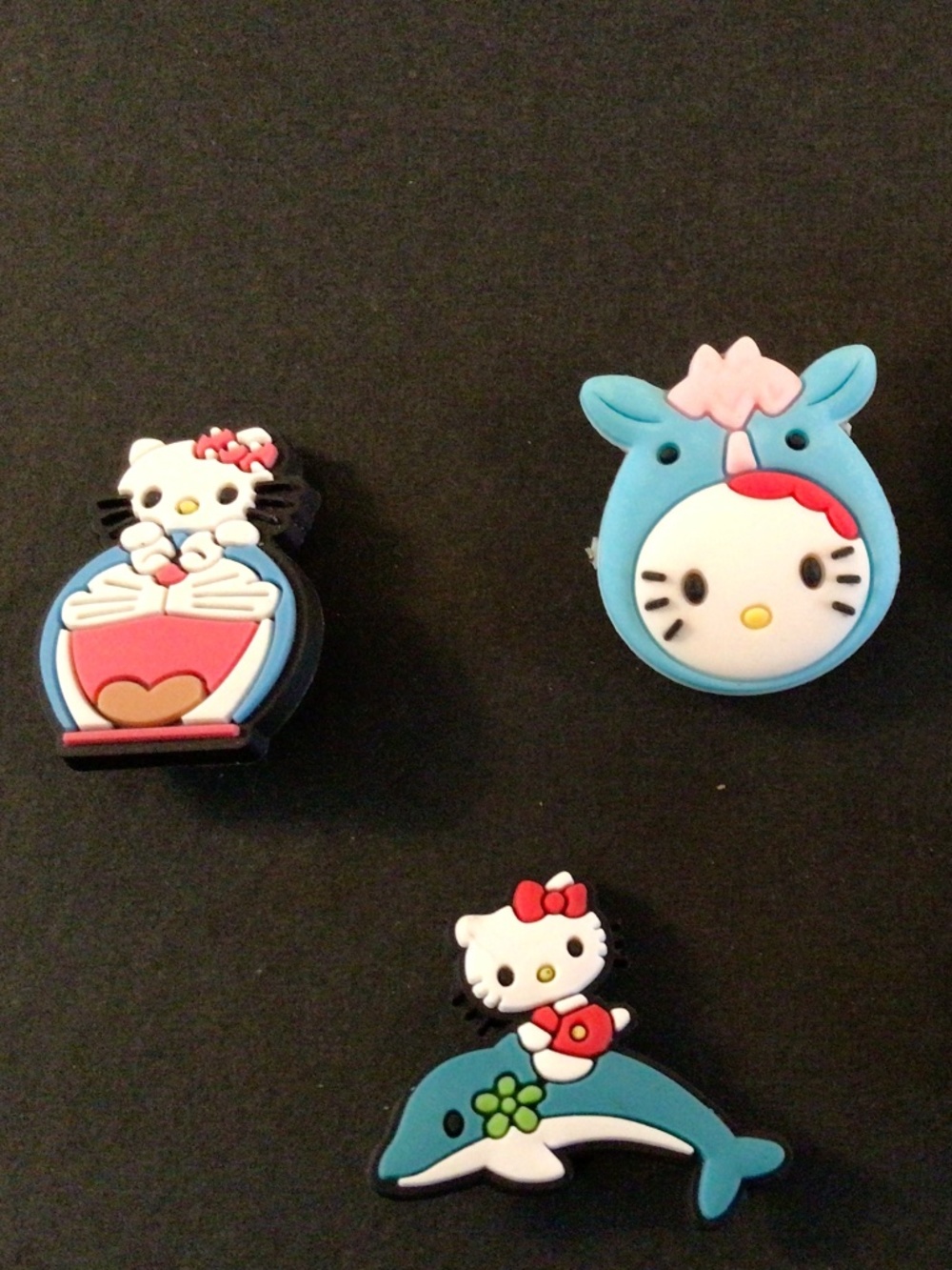 5/$25.00 Adorable whimsical hello kitty designed shoe charms sold in a lot of 5